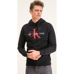 Bluza Calvin Klein Jeans Monogram J30J314557. Czarne bluzy męskie Calvin Klein Jeans, xxl, bez wzorów, z jeansu, bez kołnierzyka, bez rękawów, bez kaptura. W wyprzedaży za 289,00 zł.