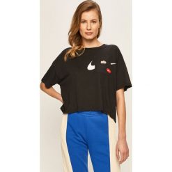 Nike - T-shirt. Czarne topy damskie Nike, s, z nadrukiem, z bawełny, z okrągłym kołnierzem. Za 149,90 zł.
