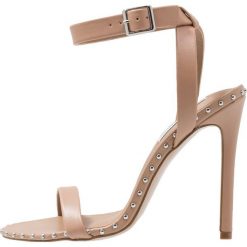 Steve Madden PIERCING Sandały na obcasie natural. Brązowe rzymianki damskie Steve Madden, z materiału, na obcasie. Za 379,00 zł.