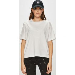 Calvin Klein Performance - Top. Białe bluzki damskie marki Calvin Klein Performance, s, bez wzorów, z elastanu, z okrągłym kołnierzem. W wyprzedaży za 149,90 zł.