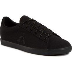Tenisówki LE COQ SPORTIF - Agate Sport 2010240 Triple Black. Czarne półbuty damskie le coq sportif, na co dzień, bez wzorów, z gumy, sportowe, bez obcasa, na płaskiej podeszwie, bez zapięcia. Za 249,00 zł.