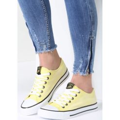 Żółte Trampki Don't Stop. Żółte trampki i tenisówki damskie marki vices, z nadrukiem, na sznurówki. Za 59,99 zł.