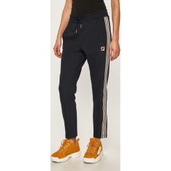 Fila - Spodnie sportowe. Niebieskie spodnie damskie Fila, s, bez wzorów, z elastanu. W wyprzedaży za 249,90 zł.