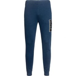 Spodnie EA7 EMPORIO ARMANI. Niebieskie spodnie męskie EA7 Emporio Armani, bez wzorów, z dresówki. W wyprzedaży za 294,00 zł.