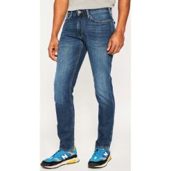 Jeansy Slim Fit Emporio Armani 3H1J06 1D9RZ 0942. Niebieskie jeansy męskie Emporio Armani, m, bez wzorów, z bawełny. W wyprzedaży za 499,00 zł.
