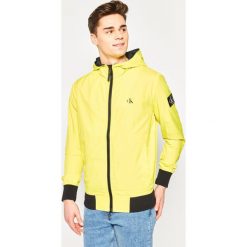 Kurtka przejściowa Calvin Klein Jeans Hooded Zip Up J30J314853. Żółte kurtki męskie Calvin Klein Jeans, xxl, bez wzorów, z poliesteru, bez kaptura. W wyprzedaży za 499,00 zł.