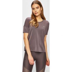 Under Armour - Top. Różowe bluzki damskie Under Armour, s, bez wzorów, z elastanu, z okrągłym kołnierzem. W wyprzedaży za 99,90 zł.
