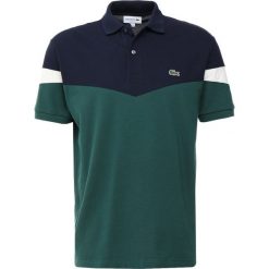 Lacoste PH936500 Koszulka polo aconit/navy blue flour. Zielone koszulki męskie Lacoste, xl, bez wzorów, z bawełny, polo, bez rękawów. Za 539,00 zł.