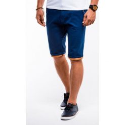 Krótkie spodenki męskie chino W150 - ciemnoniebieskie. Niebieskie spodenki i szorty męskie Ombre Clothing, s, bez wzorów, z bawełny, klasyczne, krótkie. Za 39,00 zł.