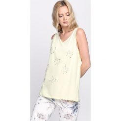 Żółta Bluzka Evening Sequins. Żółte bluzki damskie marki Born2be, s, bez wzorów, z okrągłym kołnierzem, bez rękawów. Za 34,99 zł.