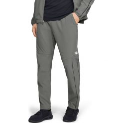 Under Armour Spodnie dresowe Zielony. Zielone spodnie męskie Under Armour, xxl, bez wzorów, z bawełny. Za 550,95 zł.