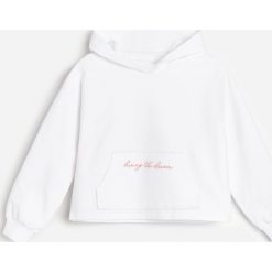 Bawełniana bluza dresowa z kapturem - Kremowy. Białe bluzy damskie Reserved, z bawełny, z kapturem. Za 49,99 zł.