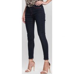Granatowe Jeansy Distress. Niebieskie jeansy damskie other. Za 64,99 zł.