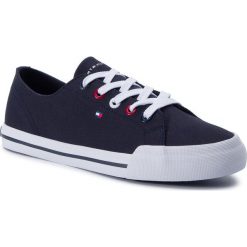 Tenisówki TOMMY HILFIGER - Tommy Essential Sneaker FW0FW04139 Midnight 403. Niebieskie półbuty damskie TOMMY HILFIGER, na co dzień, bez wzorów, z gumy, bez obcasa, na płaskiej podeszwie, bez zapięcia. W wyprzedaży za 239,00 zł.