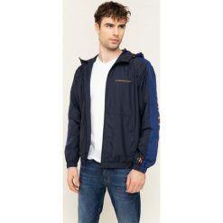 Kurtka przejściowa Calvin Klein Jeans Windbreaker J30J314239. Niebieskie kurtki męskie Calvin Klein Jeans, m, bez wzorów, z bawełny, bez kaptura. W wyprzedaży za 399,00 zł.