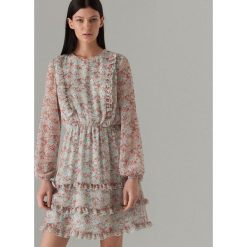Mini sukienka w kwiaty - Turkusowy. Niebieskie sukienki damskie Mohito, w kwiaty, bez kołnierzyka, bez rękawów, mini. Za 179,99 zł.