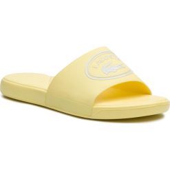 Klapki LACOSTE - L.30 Slide 119 1 Cuj 7-37CUJ0010241 Light Yellow/White. Żółte klapki damskie Lacoste, bez wzorów, z tworzywa sztucznego, bez obcasa. W wyprzedaży za 149,00 zł.