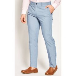 Spodnie materiałowe Tommy Hilfiger Tailored Flex Fks Washed TT0TT06987. Niebieskie jeansy męskie Tommy Hilfiger Tailored, m, bez wzorów, z bawełny. W wyprzedaży za 399,00 zł.