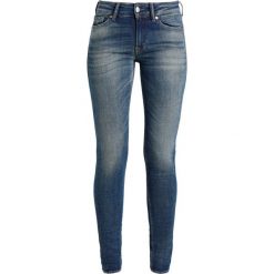 Kings Of Indigo JUNO Jeansy Slim Fit denim dark used tinted worn. Niebieskie rurki damskie marki Kings Of Indigo. W wyprzedaży za 412,30 zł.