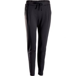 Spodnie do dynamicznej jogi STUDIO damskie. Czarne spodnie damskie DOMYOS, xl, z elastanu. Za 129,99 zł.