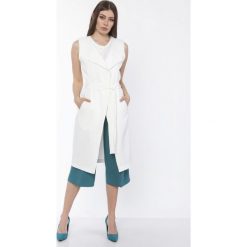 Kamizelka damska elegancka ecru - 40. Kamizelki damskie e-margeritka.pl, s, bez wzorów, z poliesteru, eleganckie, z długim rękawem, długie, bez kaptura. Za 139,99 zł.