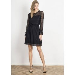 Sukienka wieczorowa rozkloszowana czarna - 36. Czarne sukienki damskie e-margeritka.pl, bez wzorów, z tkaniny, eleganckie, z falbankami, bez rękawów, rozkloszowane. Za 268,99 zł.