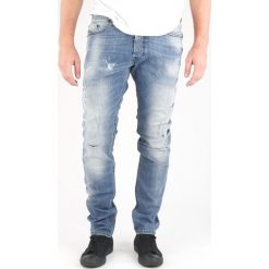 Diesel Tepphar Dżinsy Niebieski. Niebieskie jeansy męskie Diesel, bez wzorów. Za 1300,95 zł.