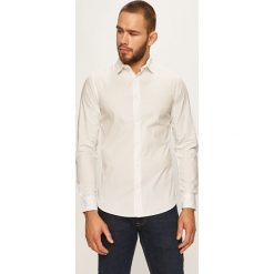 Produkt by Jack & Jones - Koszula. Czarne koszule męskie PRODUKT by Jack & Jones, s, bez wzorów, z elastanu, eleganckie, z klasycznym kołnierzykiem, z długim rękawem. W wyprzedaży za 69,90 zł.