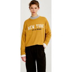 Bluzy rozpinane damskie: Bluza z napisem „New York”