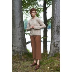 Sweter wełniany w warkocze, beżowy. Brązowe kardigany damskie marki Pakamera, s, z wełny. Za 340,00 zł.