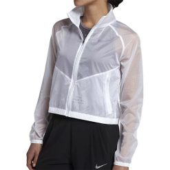 Kurtka do biegania damska NIKE TRANSPARENT JACKET / 923440-100. Kurtki damskie Nike, bez wzorów, bez kaptura, do biegania. Za 289,99 zł.