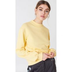 NA-KD Basic Bluza basic - Yellow. Żółte bluzy damskie marki NA-KD Basic, bez wzorów, prążkowane, bez rękawów, bez kaptura. Za 100,95 zł.