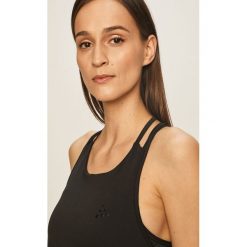 Craft - Top. Czarne topy damskie Craft, s, bez wzorów, z elastanu, z okrągłym kołnierzem. Za 179,90 zł.