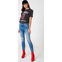 Calvin Klein Jeansy Skinny Ankle Raw - Blue. Niebieskie jeansy damskie skinny marki Calvin Klein, z denimu. W wyprzedaży za 257,48 zł.