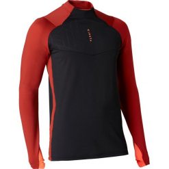 Bluza do piłki nożnej TRAXIUM z krótkim suwakiem. Czarne bluzy męskie KIPSTA, xl, bez wzorów, z elastanu, bez kołnierzyka, z krótkim rękawem, krótkie, bez kaptura. Za 89,99 zł.