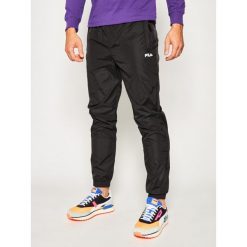 Spodnie dresowe Fila Cappy 687683. Czarne jeansy męskie Fila, xs, bez wzorów. W wyprzedaży za 309,00 zł.