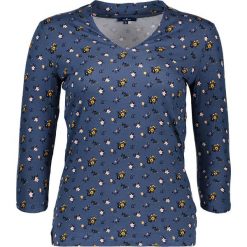 Koszulka w kolorze niebieskim ze wzorem. Niebieskie bluzki damskie Tom Tailor, xl, bez wzorów, bez kołnierzyka, z długim rękawem. W wyprzedaży za 42,95 zł.