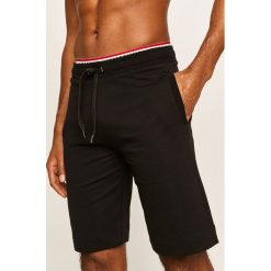 Moschino Underwear - Szorty. Czarne spodenki i szorty męskie Moschino Underwear, s, bez wzorów, z elastanu, casualowe. Za 619,90 zł.
