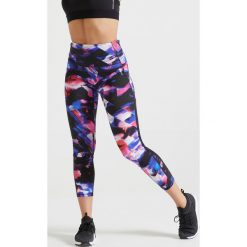 Legginsy 7/8 fitness cardio FLE 500A damskie. Legginsy sportowe damskie DOMYOS, xs, w paski, z elastanu, na fitness i siłownię. Za 89,99 zł.