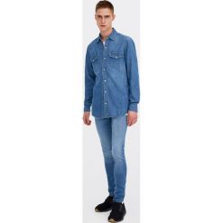 Jeansowa koszula w kowbojskim stylu. Niebieskie koszule męskie Pull&Bear, m, bez wzorów, z jeansu, bez kołnierzyka, z długim rękawem, długie. Za 89,90 zł.
