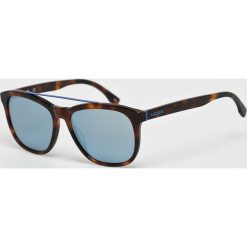 Lacoste - Okulary L822S.214. Żółte okulary przeciwsłoneczne męskie Lacoste, z materiału, prostokątne. W wyprzedaży za 229,90 zł.