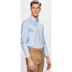 Tommy Hilfiger - Koszula. Niebieskie koszule męskie TOMMY HILFIGER, s, bez wzorów, z bawełny, bez kołnierzyka, z długim rękawem. W wyprzedaży za 259,90 zł.