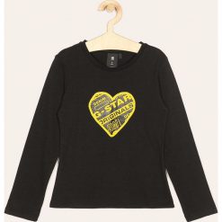 G-Star Raw - Longsleeve dziecięcy 128-164 cm. Czarne bluzki dziewczęce G-Star RAW, z nadrukiem, z bawełny, z okrągłym kołnierzem, z długim rękawem, długie, bez kaptura. W wyprzedaży za 139,90 zł.