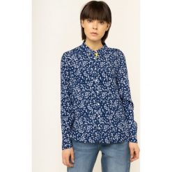 Koszula Tommy Jeans Floral DW0DW07654. Niebieskie bluzki damskie Tommy Jeans, l, bez wzorów, z wiskozy, bez kołnierzyka, bez rękawów. W wyprzedaży za 279,00 zł.