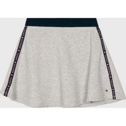 Tommy Hilfiger - Spódnica dziecięca 122-176 cm. Szare spódniczki dziewczęce TOMMY HILFIGER, bez wzorów, z bawełny, mini, rozkloszowane. W wyprzedaży za 169,90 zł.