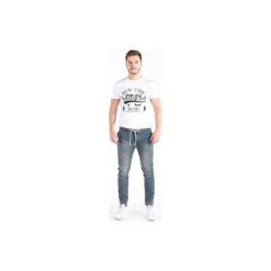 Spodnie męskie jeansowe jogger z kieszeniami, z rozporkiem. Niebieskie joggery męskie marki House, z jeansu. Za 48,99 zł.