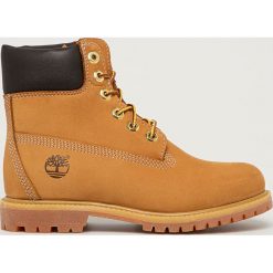 Timberland - Workery zamszowe Premium 6. Żółte workery damskie Timberland, ze skóry, z okrągłym noskiem, bez obcasa, na obcasie, na sznurówki. Za 929,90 zł.