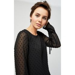 Koszula ze ściągaczami. Koszule damskie Moodo, s, bez wzorów, bez kołnierzyka, bez rękawów. Za 49,99 zł.
