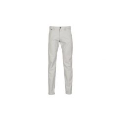 Jeansy slim fit Guess PURITOR. Szare jeansy męskie marki Guess, m, z aplikacjami. Za 279,20 zł.