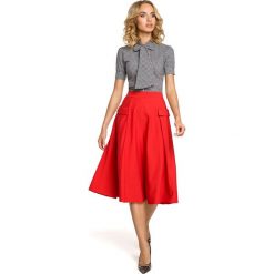 MARJOLAINE Rozkloszowana spódnica midi z kieszeniami - czerwona. Czerwone spódniczki damskie Moe, s, bez wzorów, eleganckie, midi, rozkloszowane. Za 119,90 zł.